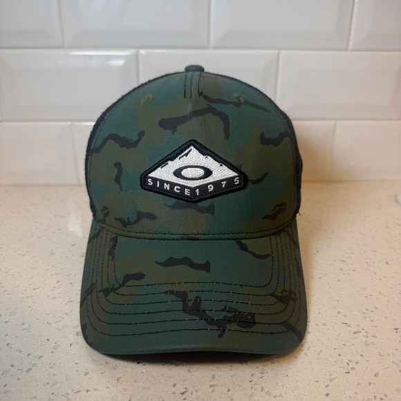 Oakley Other - Oakley green‎ and black camo trucker hat